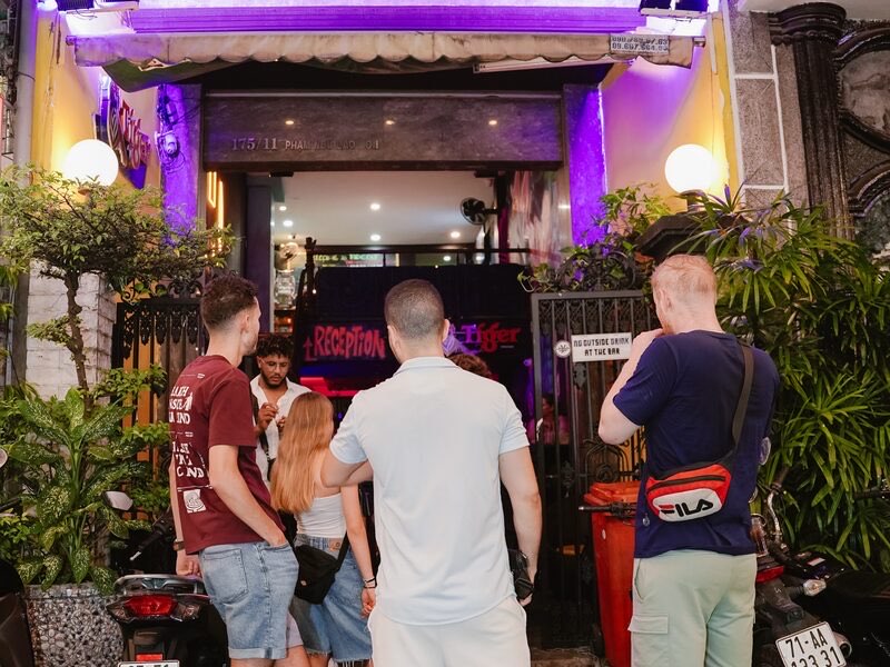 The Hideout Hostel exterior at night