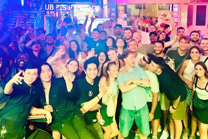 Travelers enjoying the Hideout pub crawl